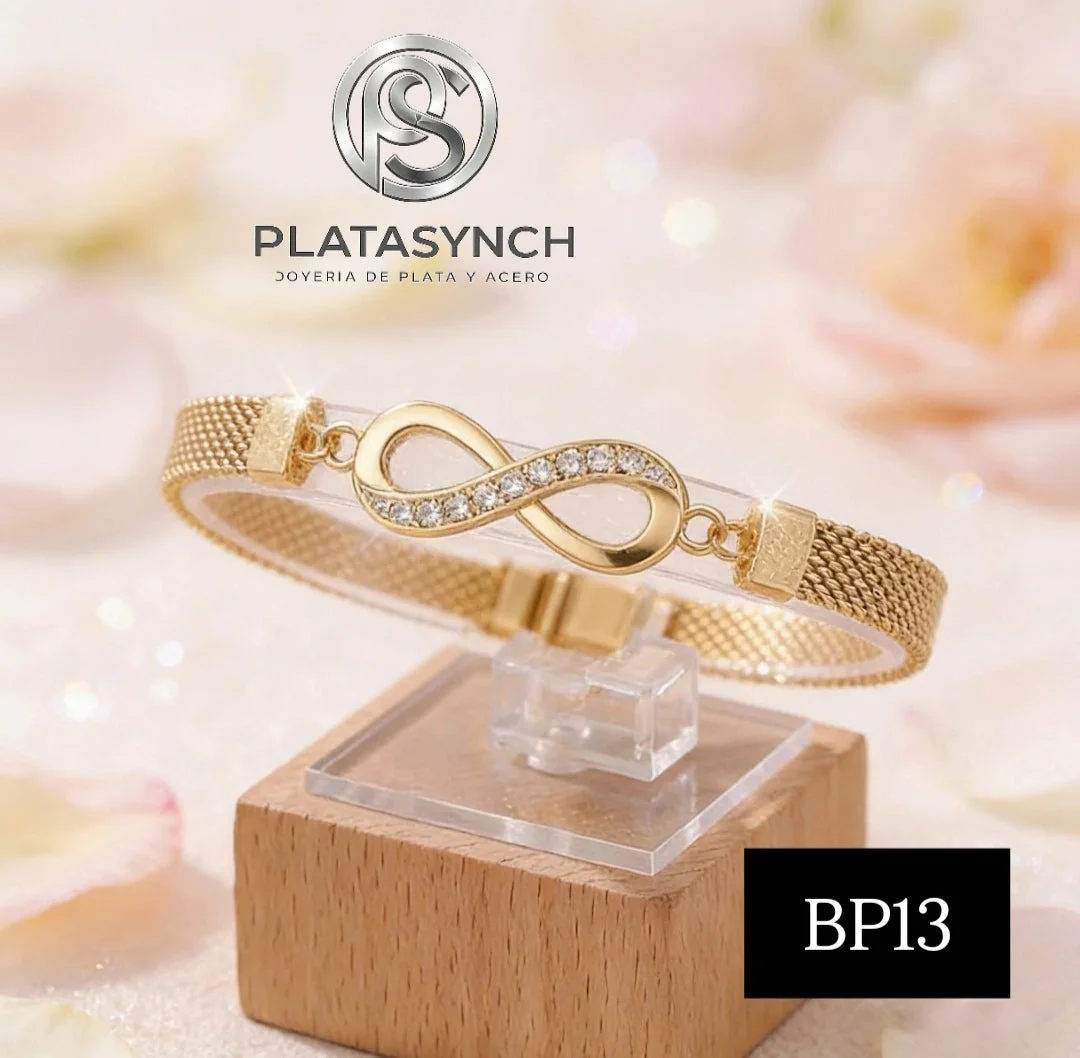 BP13 - Pulcera brass tejido dorado con dije de infinito con piedras en un eje